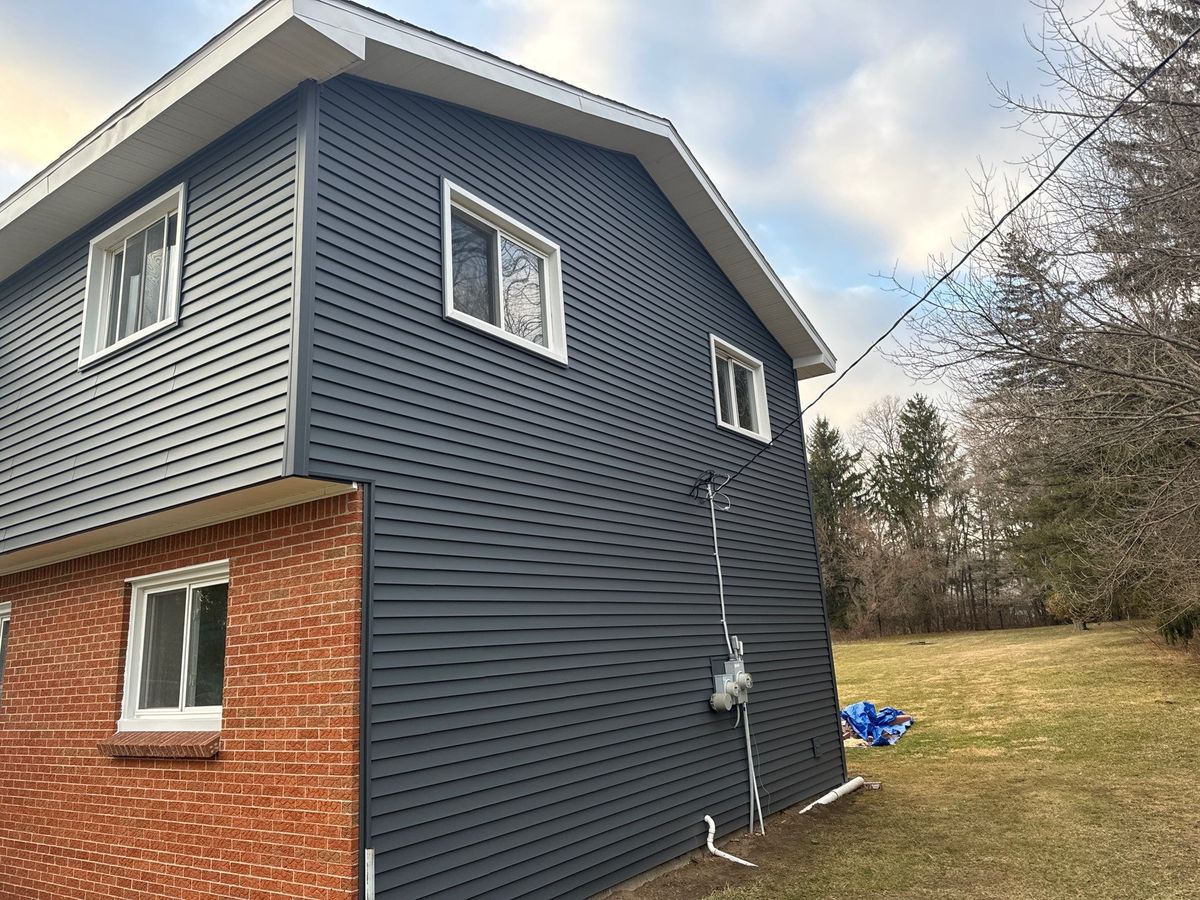 Siding for Walkers Quality Roofing  in Midland, MI