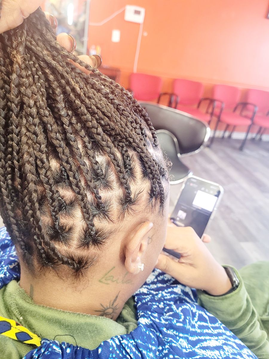Haircuts for Pascy Hair Braiding Salon & Barber Shop in Baltimore, MD