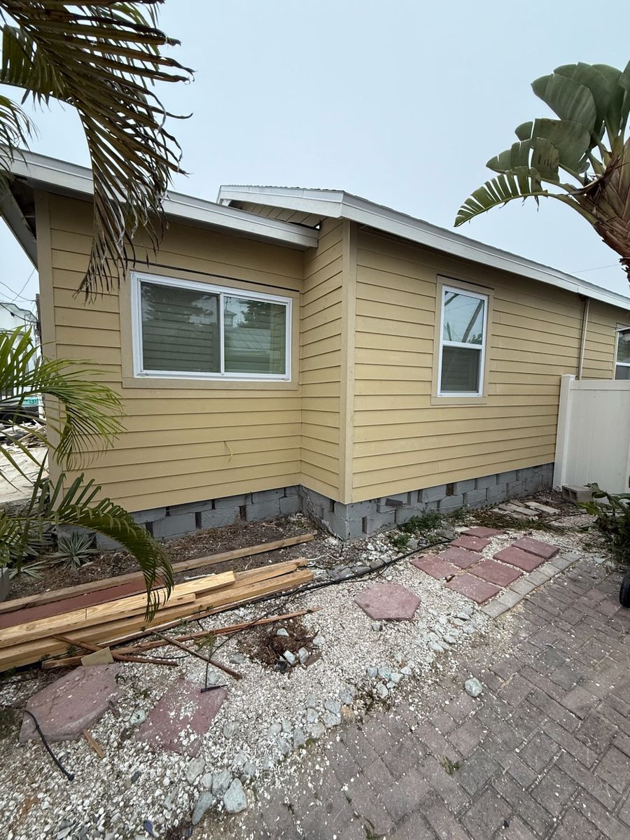 Hardie Siding Installation for Escorpio Painting in Tampa, FL