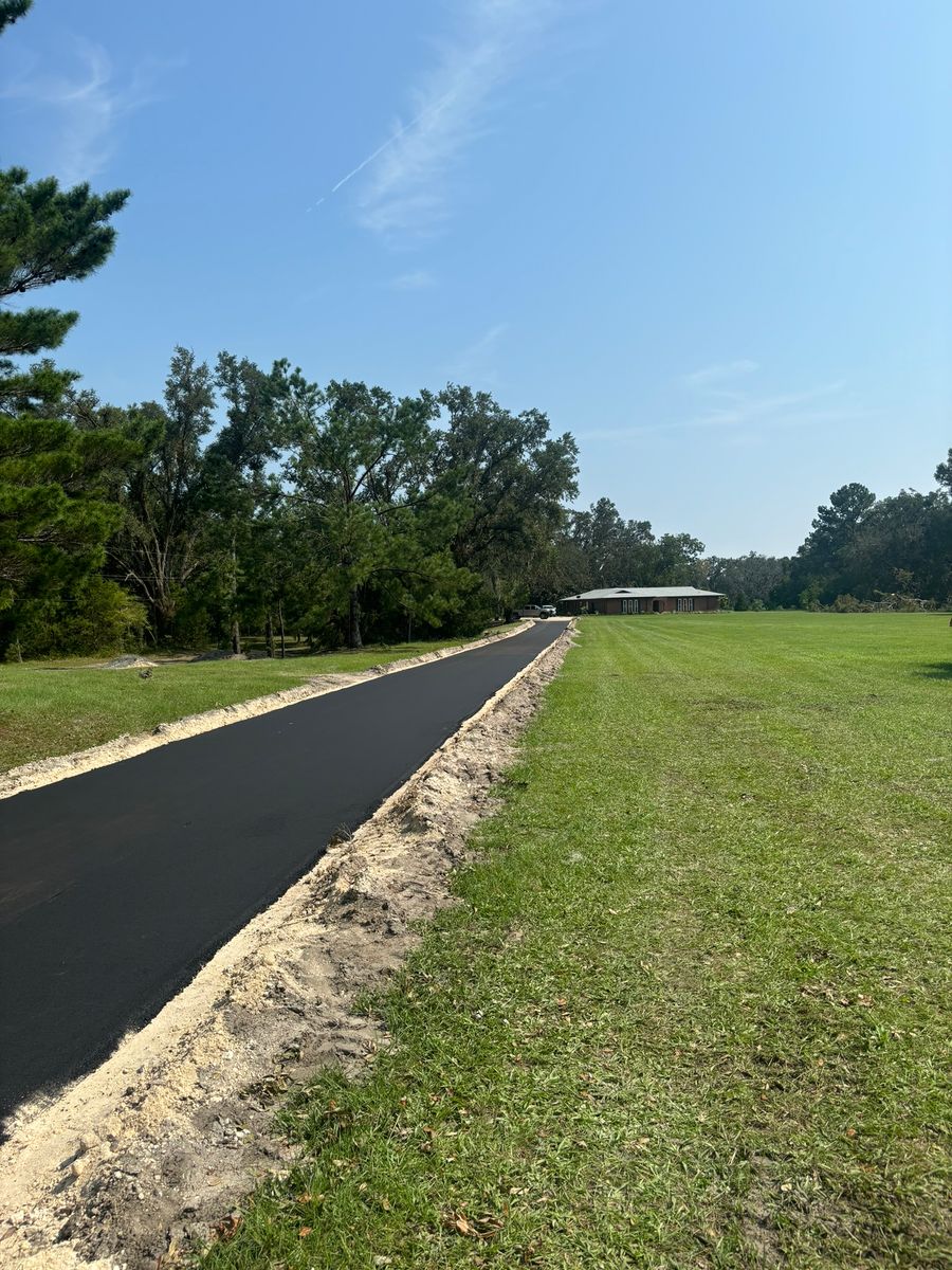 Asphalt Driveway Installation for Lamar Construction in North Central, FL