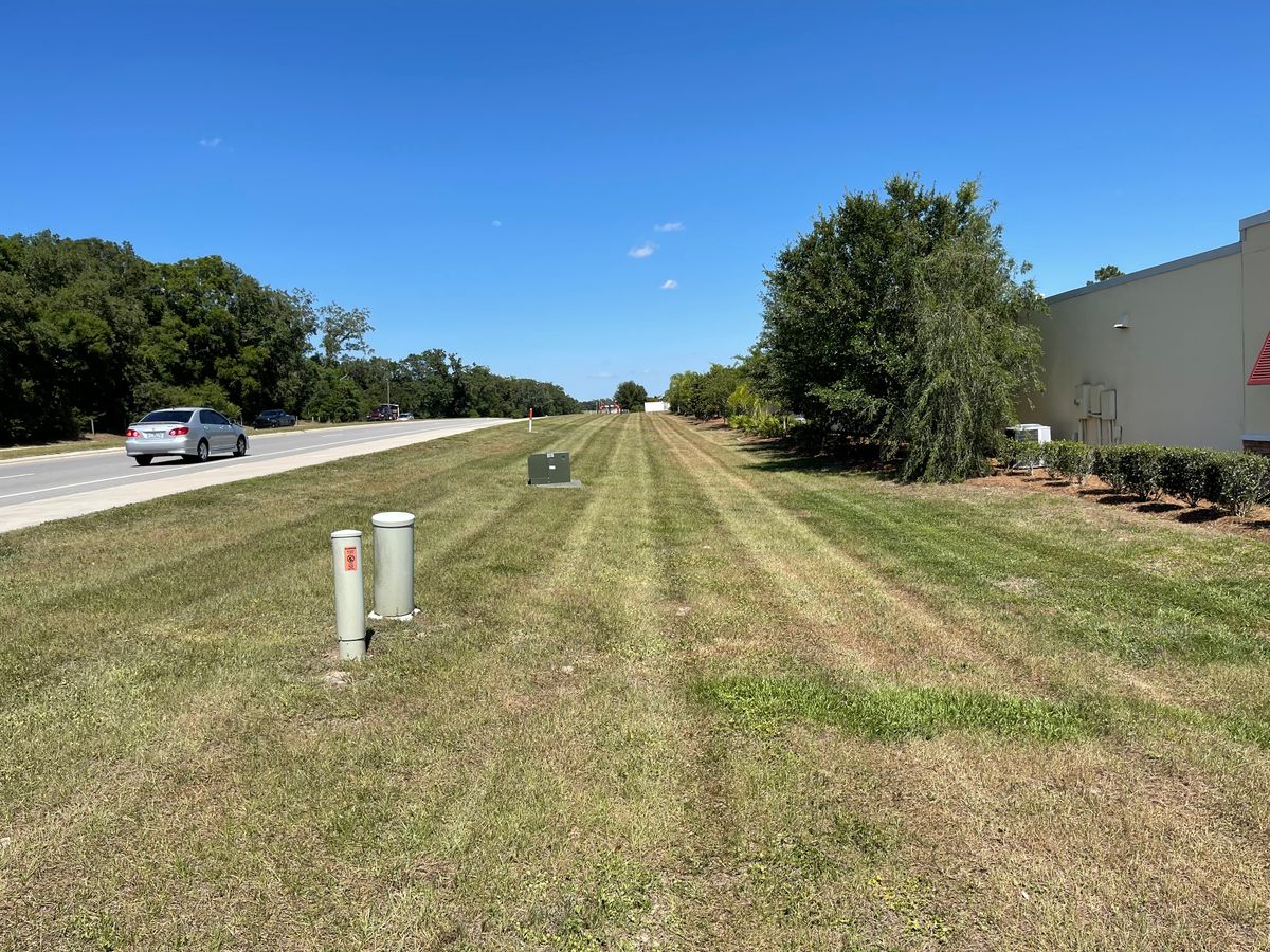 Commercial Property Maintenance for Village Lawn Services LLC in Lake Panasoffkee, FL