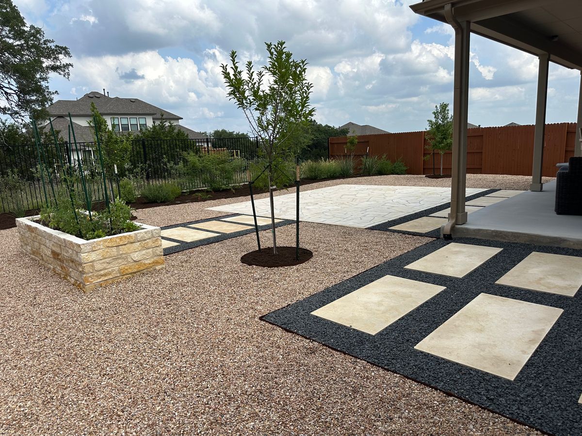 Stone Walkways and Planters for Clean Green Landscape Design in Dripping Springs, TX