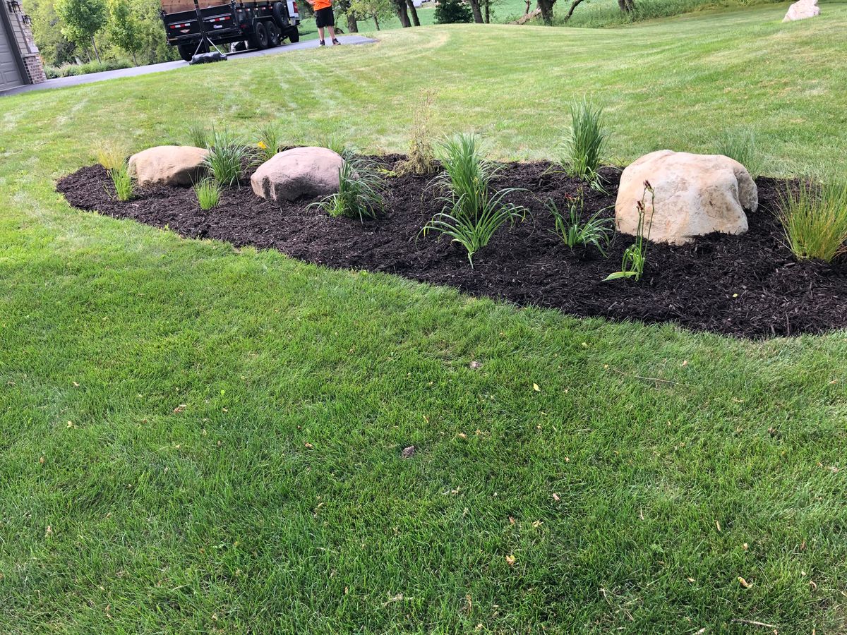 Mulch Installation for Paradise Lawnscapes in West Bend, WI