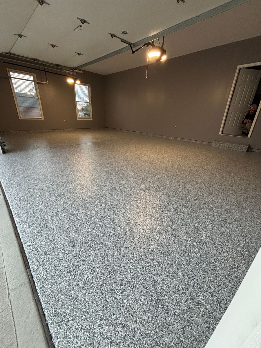 Installation of Beautiful Garage Floors for Drury Concrete Coatings in St. Charles, MO