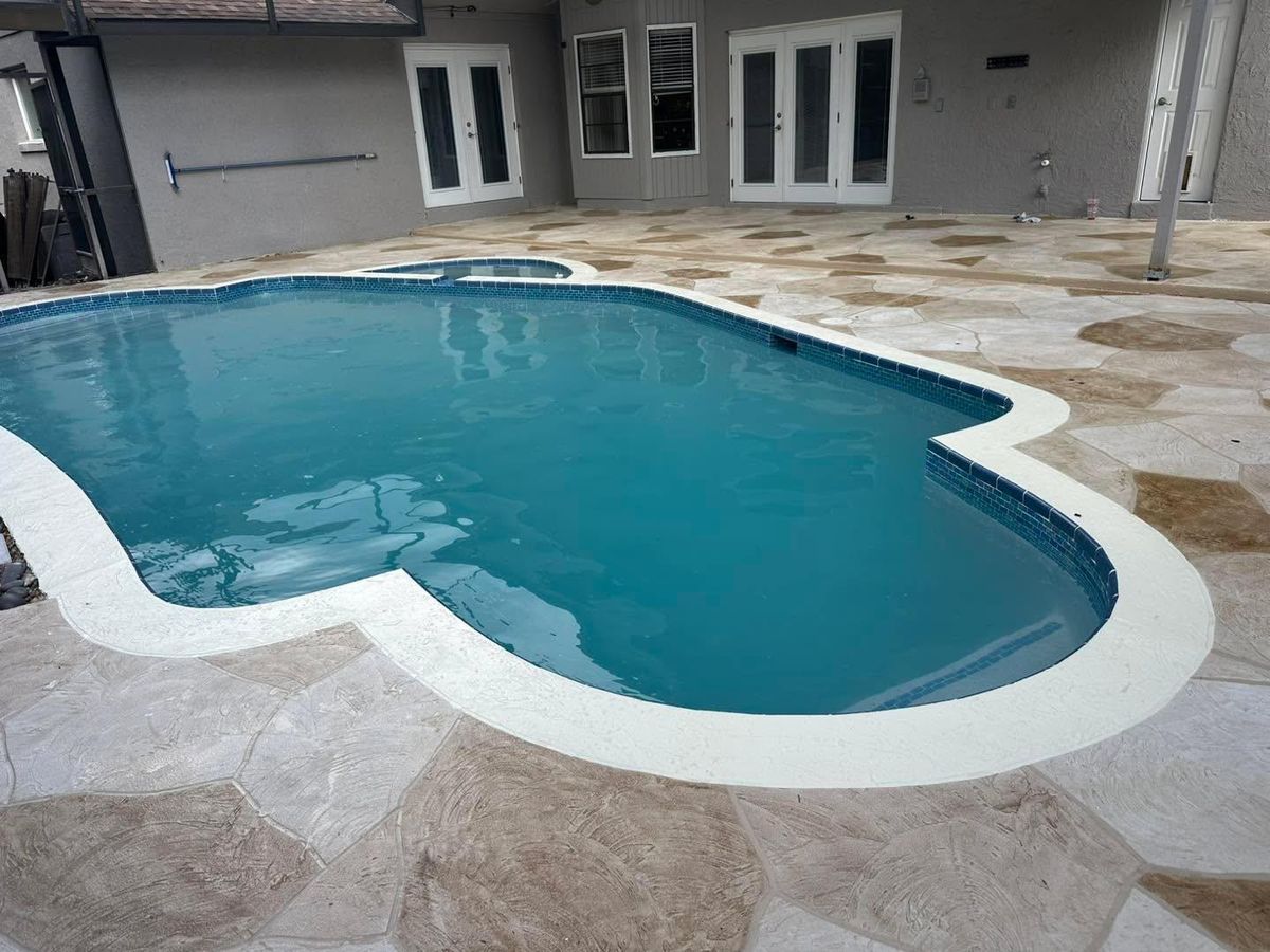 Decorative Concrete Overlays for Absolute Grey's LLC in Kissimmee, FL