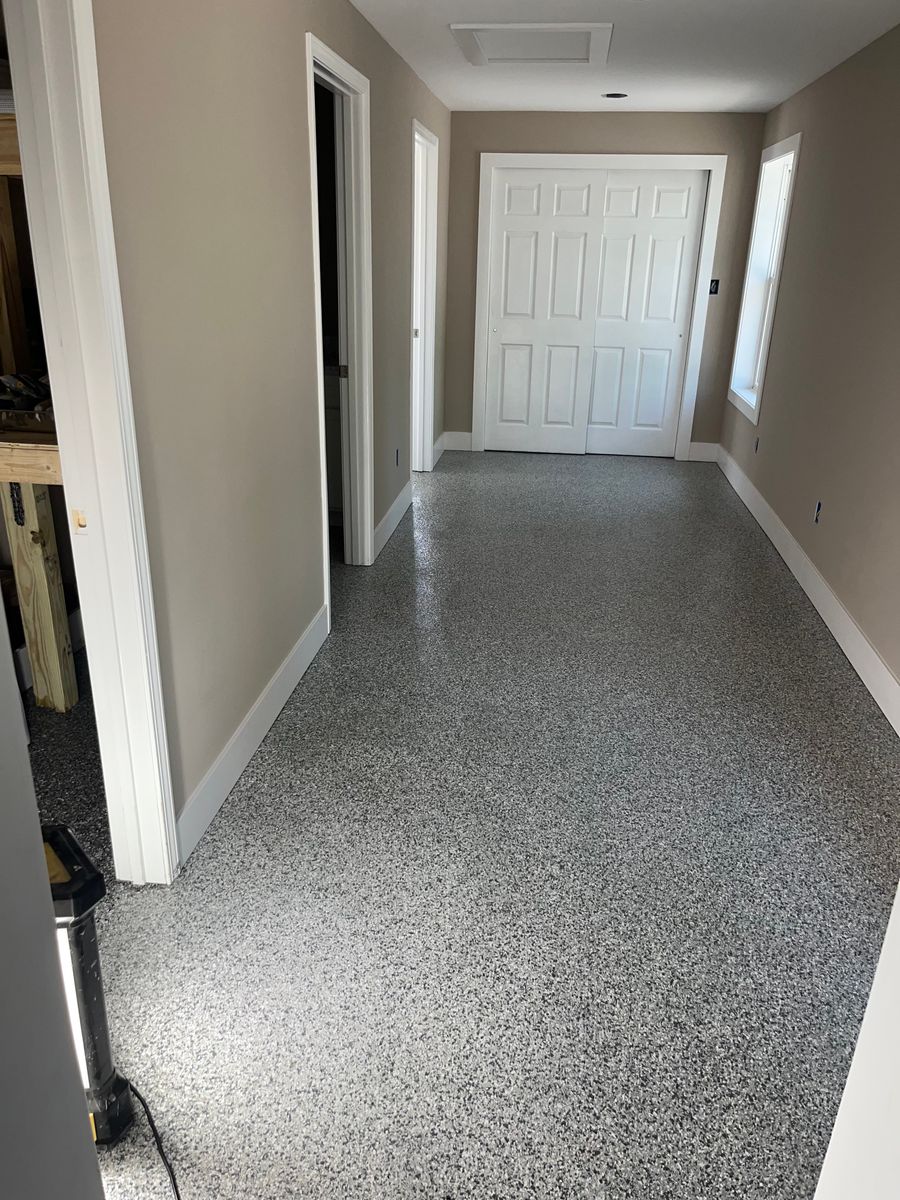 Installation of Beautiful Garage Floors for Drury Concrete Coatings in St. Charles, MO