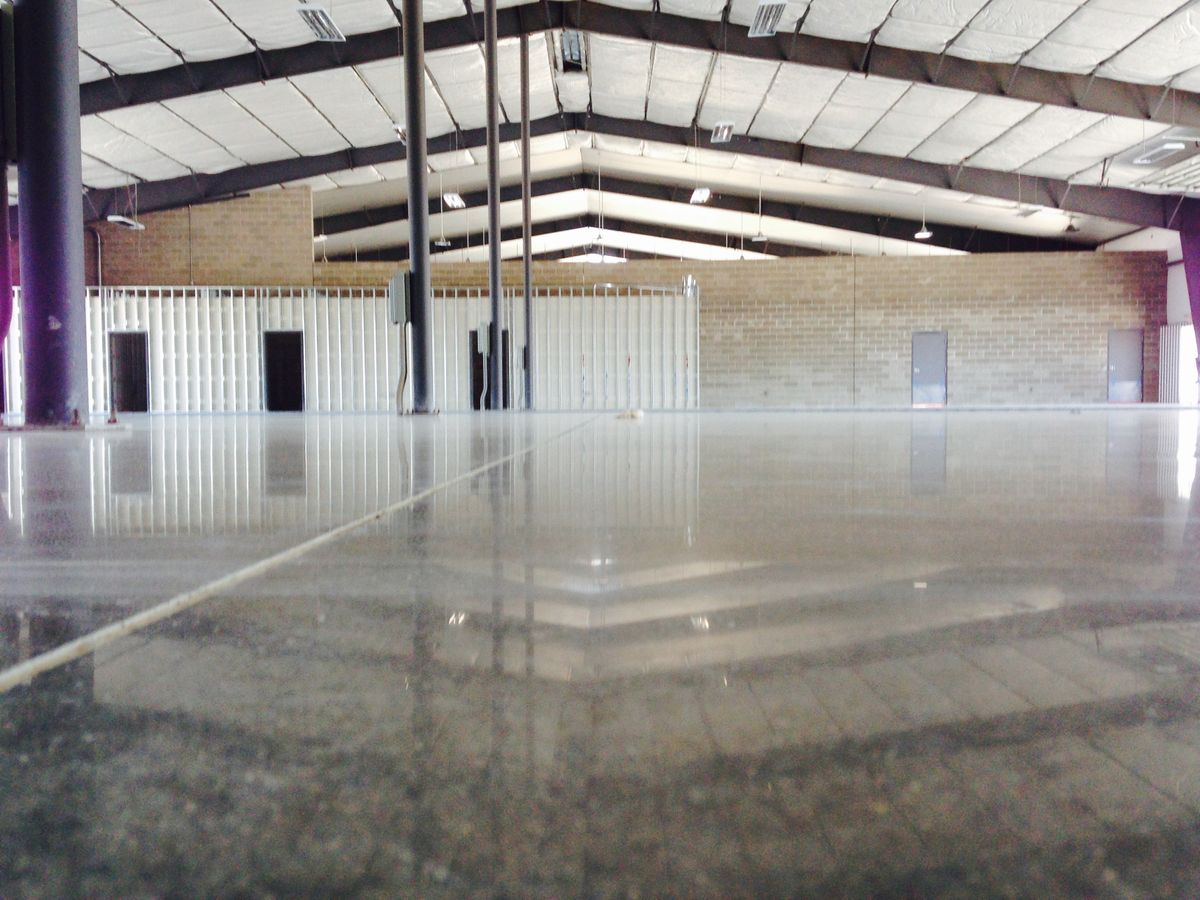 Polish-Stained Concrete for Texas Curb N Borders in Houston, TX