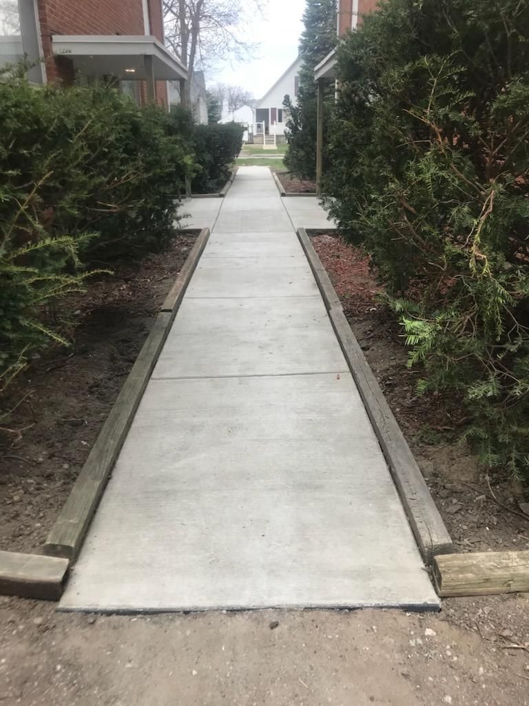 Concrete Sidewalk Installation for Deerbrook Construction in Pontiac, MI