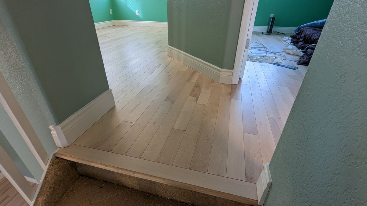 Floating Laminate, Wood, & Tile Installation for Happy Home Projects Co-op in Lakewood, CO