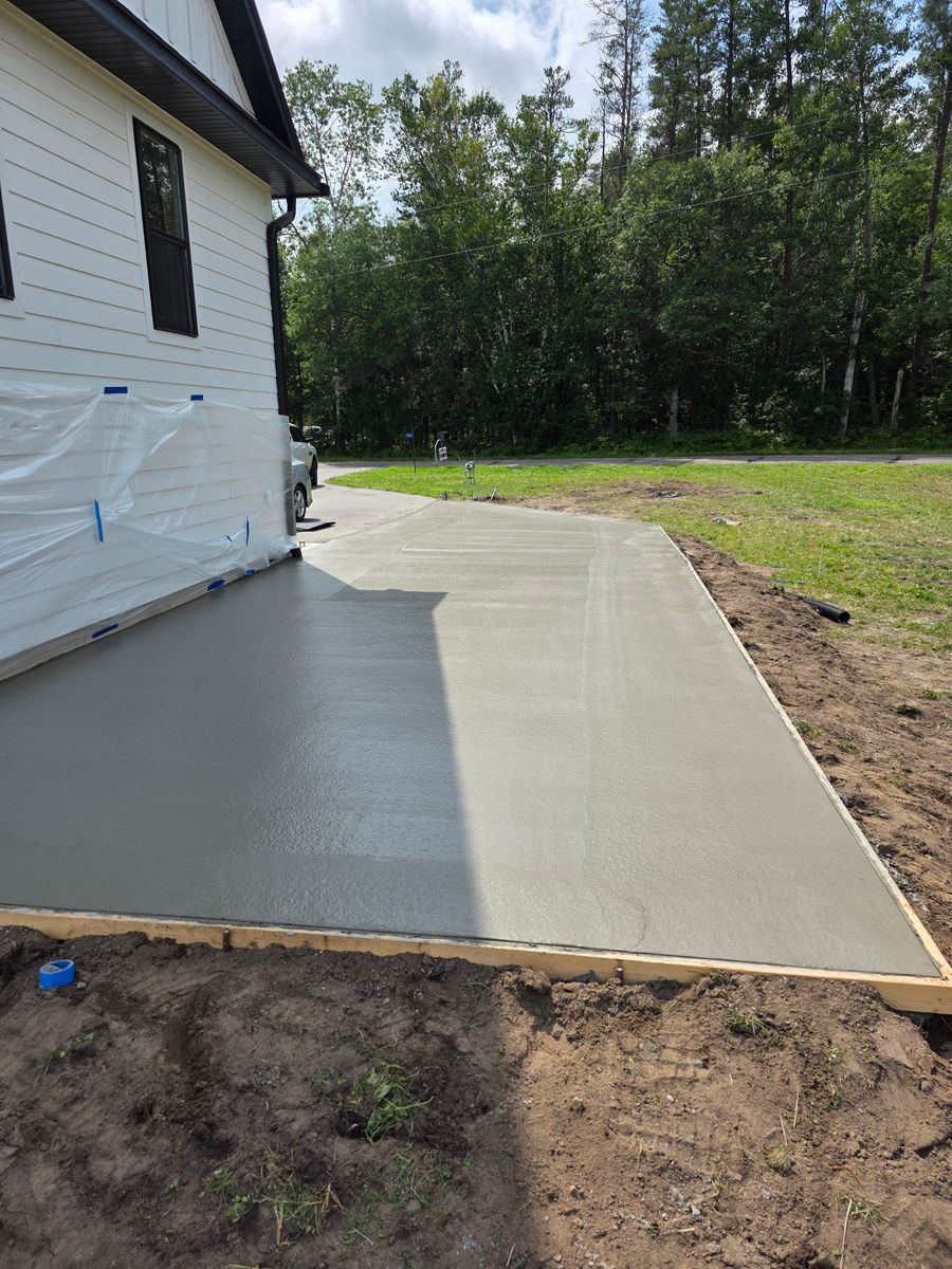 Concrete Driveway Installation for Majestic Concrete and Landscape in Cross Lake, MN