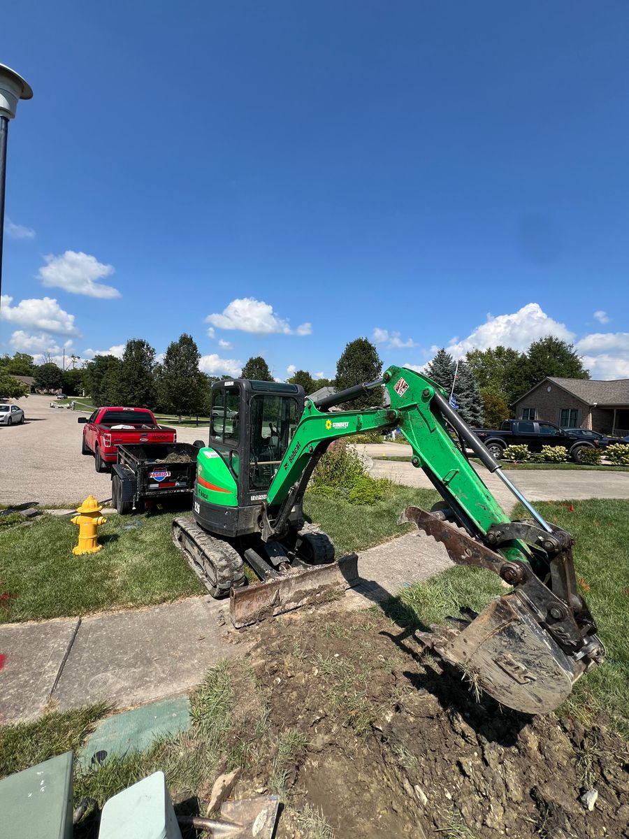 Excavation & land clearing for Woolf Outdoor Services in Mason, OH