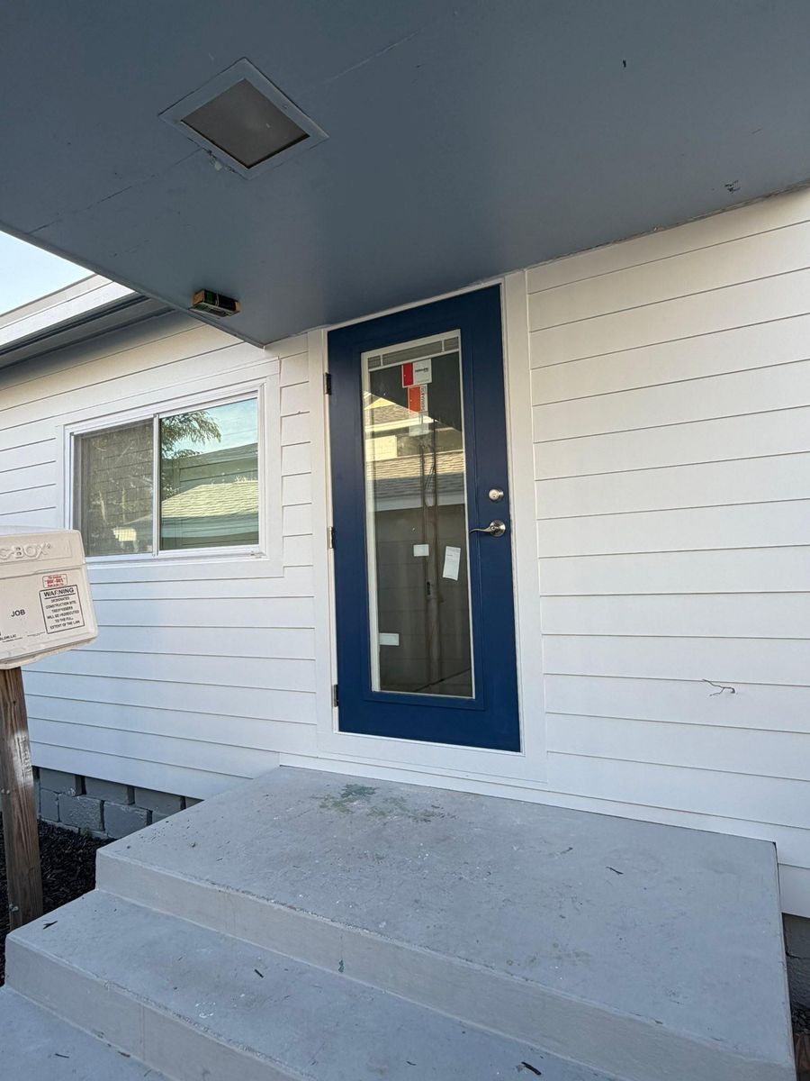 Hardie Siding Installation for Escorpio Painting in Tampa, FL