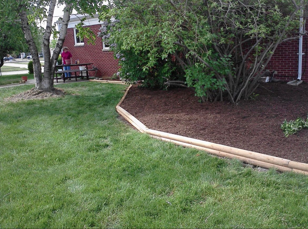 Decorative stone/Mulch Installation for Alltimate Outdoor Services in Warren, MI