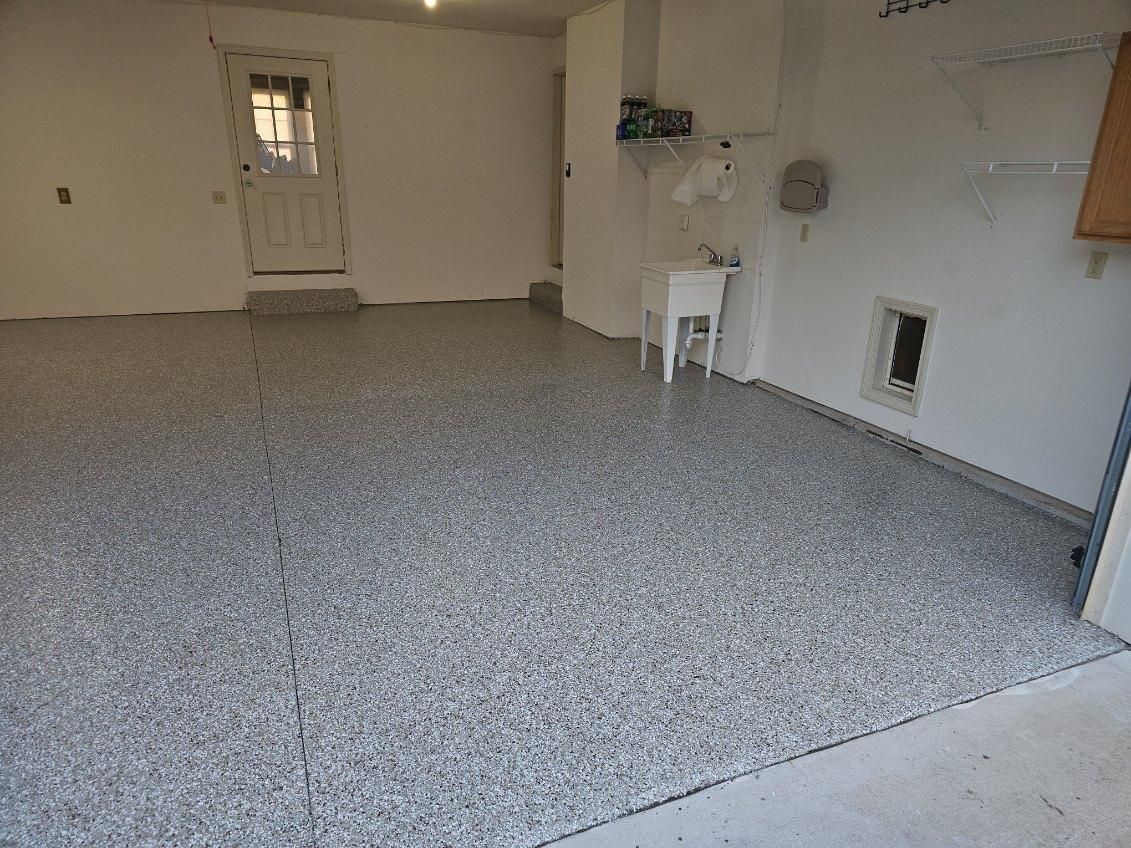 Installation of Beautiful Garage Floors for Drury Concrete Coatings in St. Charles, MO