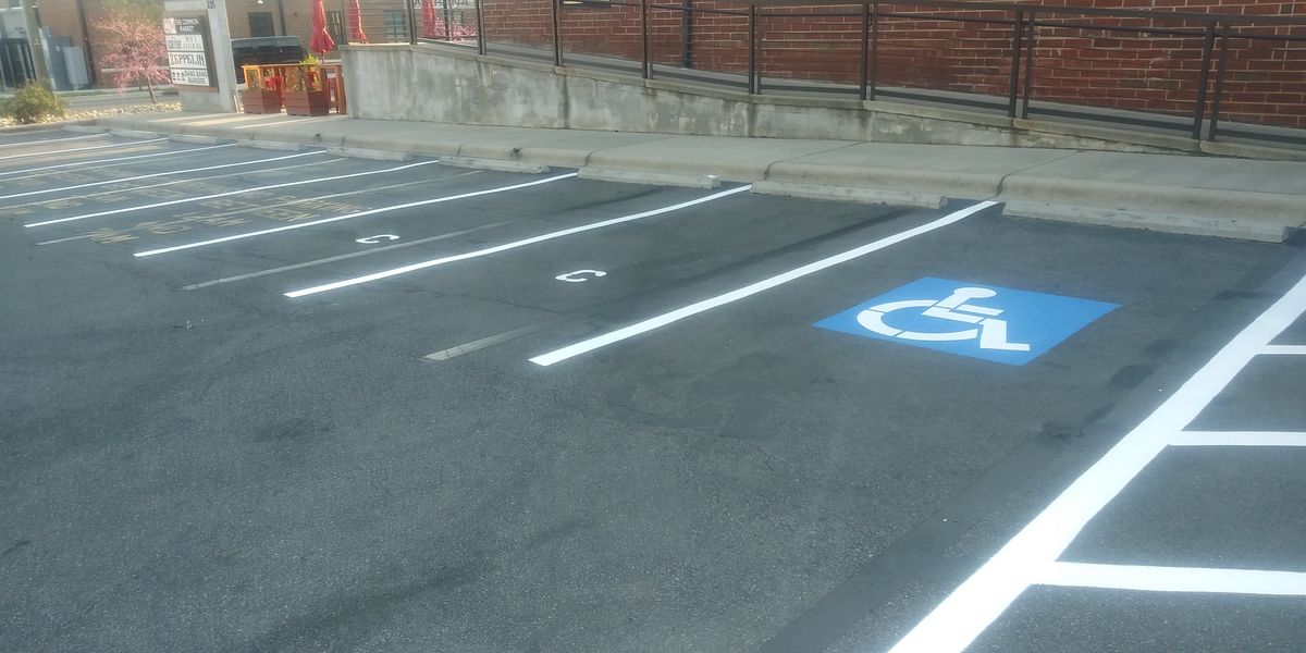 Signage for Stripe A Lot in Knoxville, TN