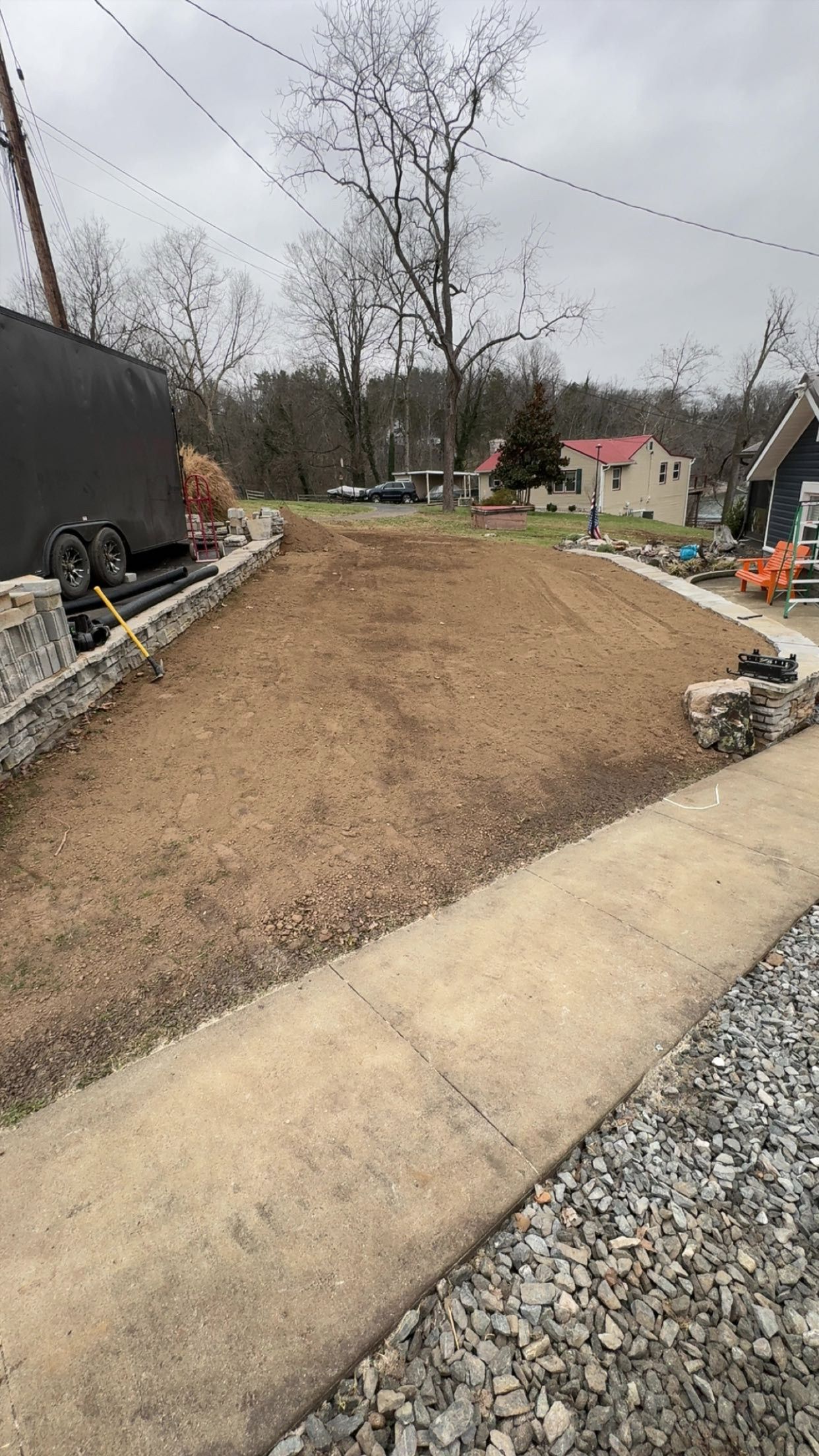 Graded strip along a new wall