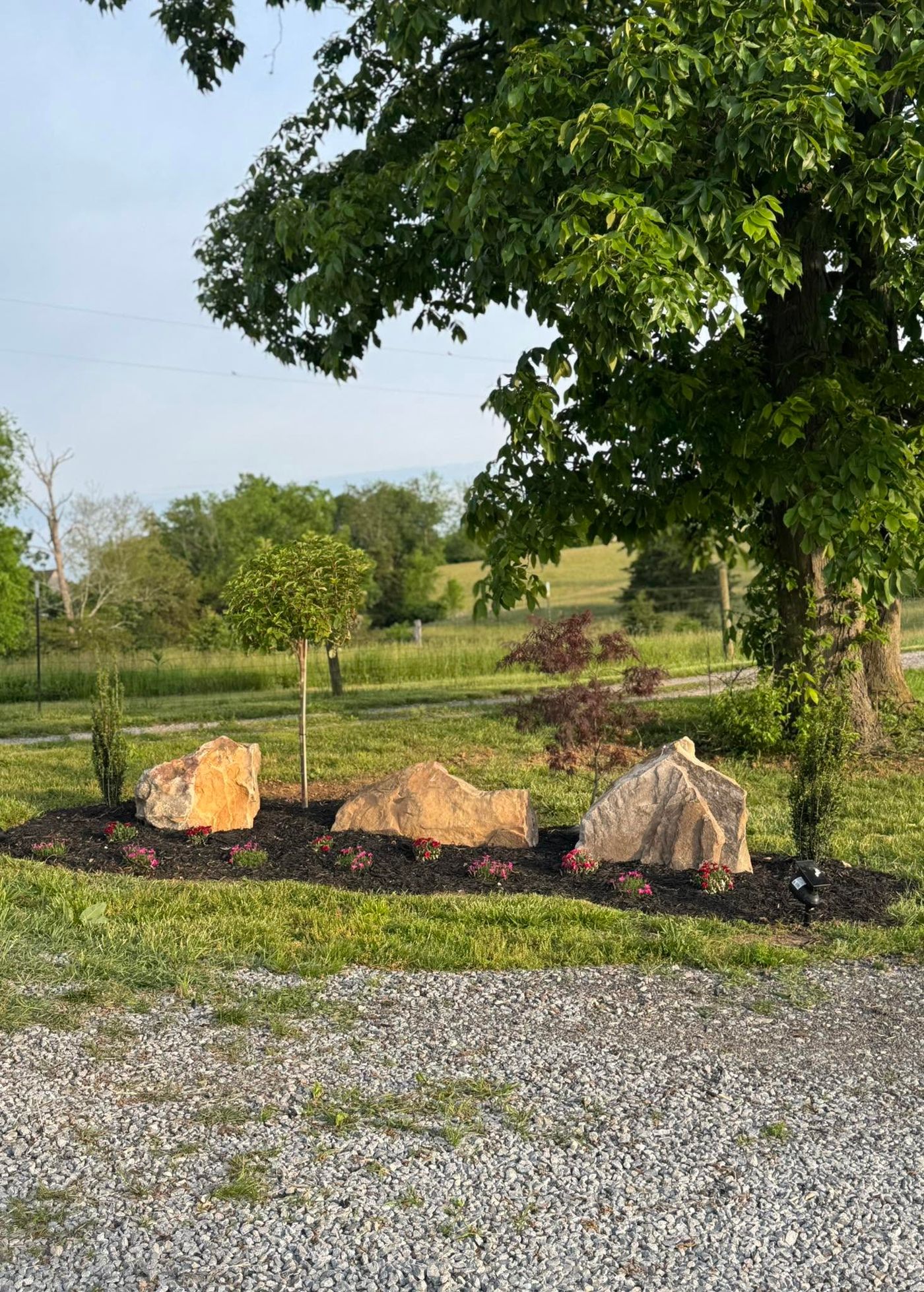 Gravel and boulders at a drive