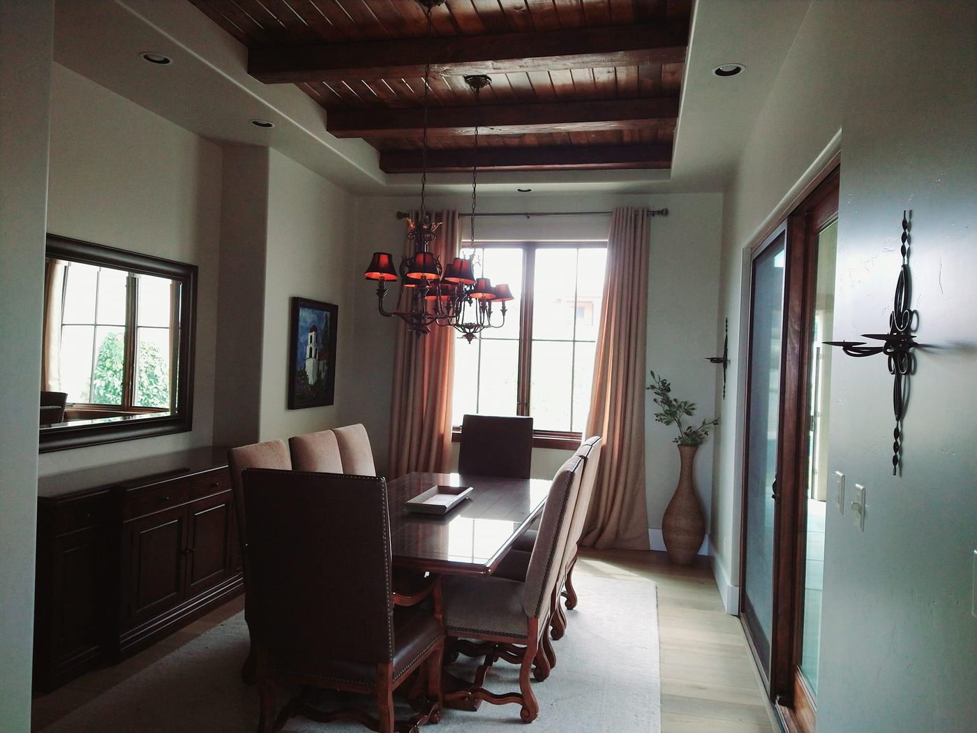 Dining room with a stained wood coffered ceiling