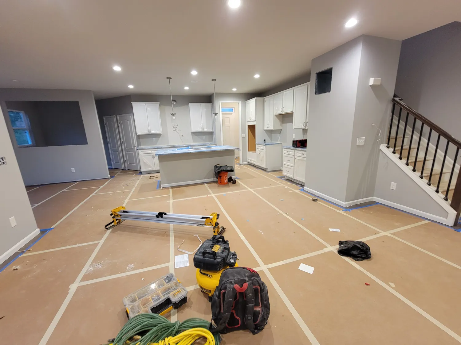 Interior remodel in progress with new cabinetry and flooring