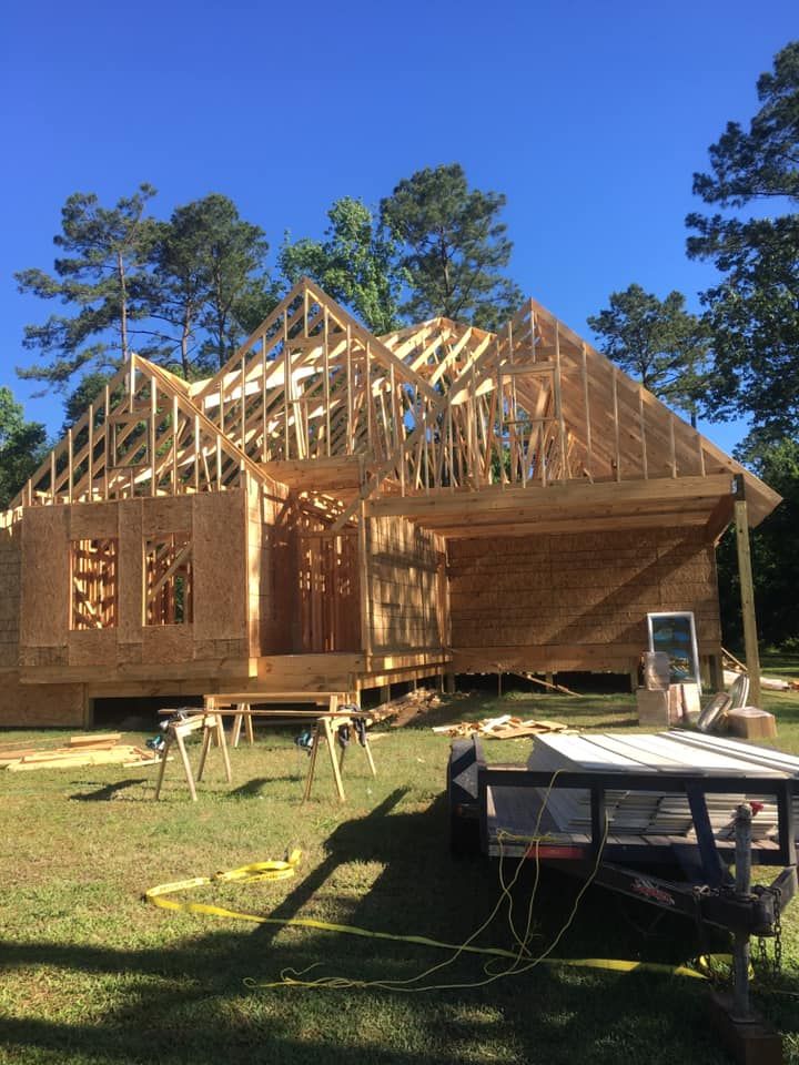 House framing and roof trusses going up