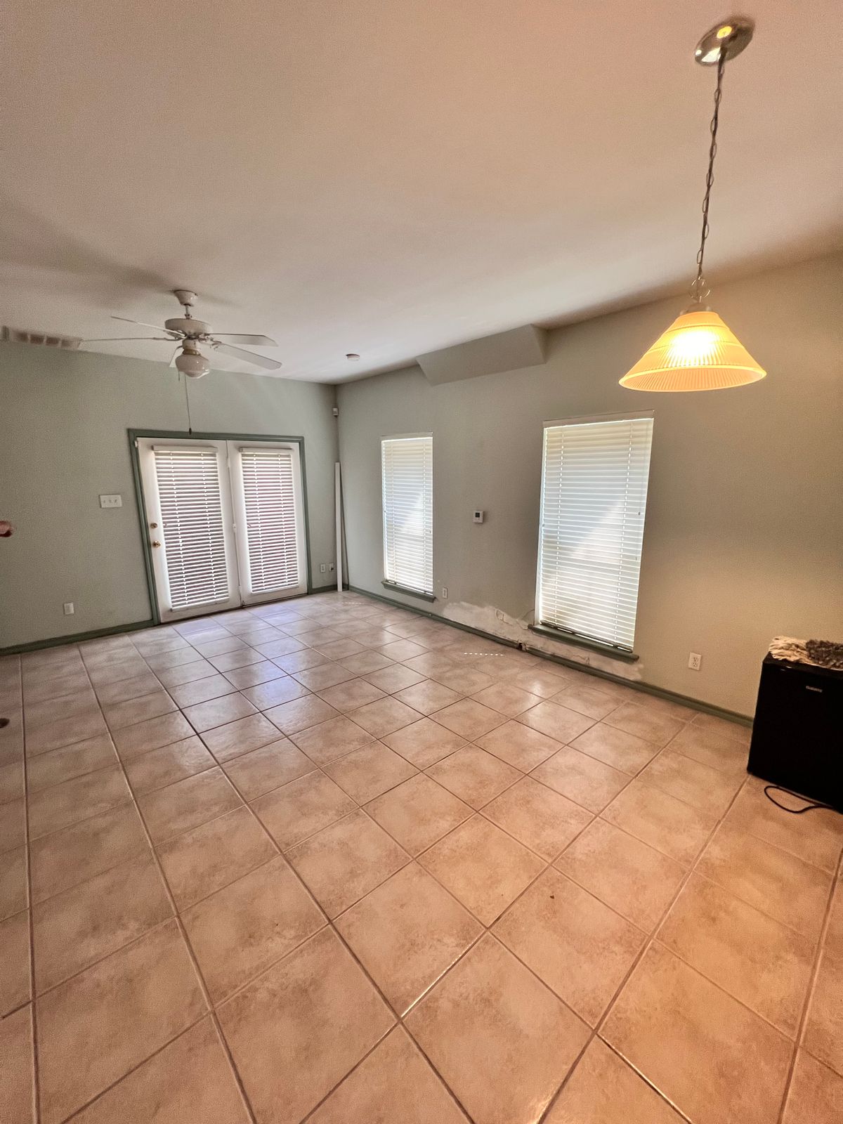 Open living room with a smooth repainted ceiling