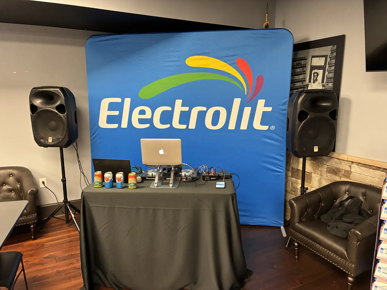 Custom branded Electrolit backdrop and table setup