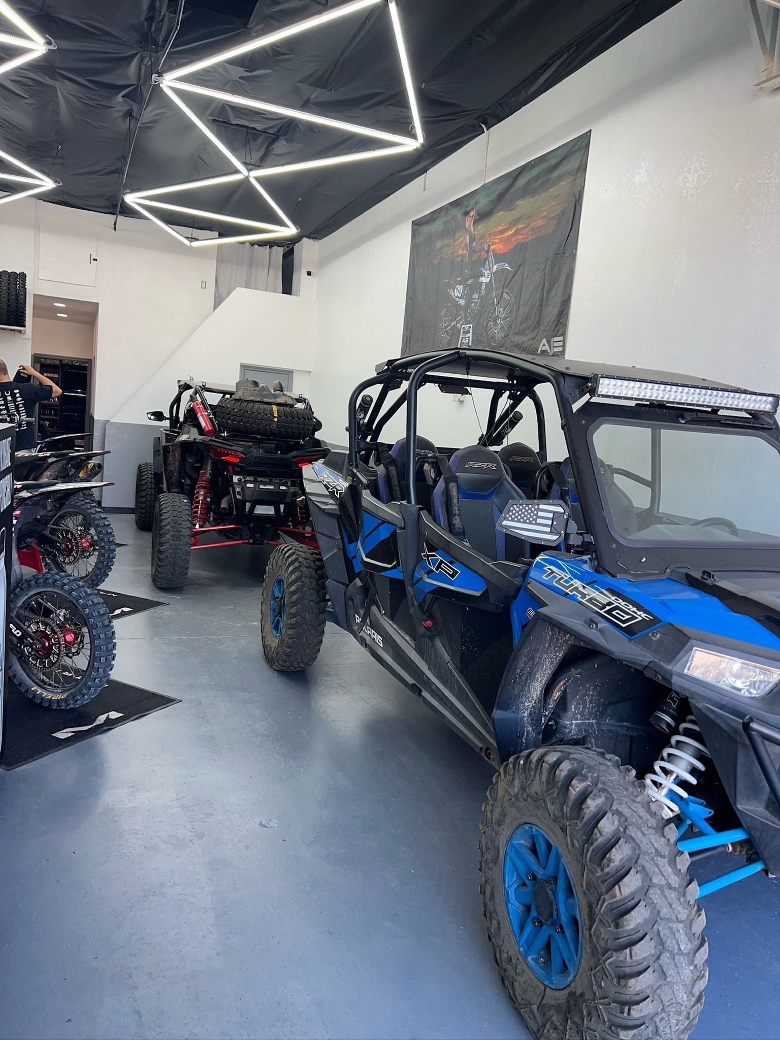 Blue Polaris RZR on the shop floor