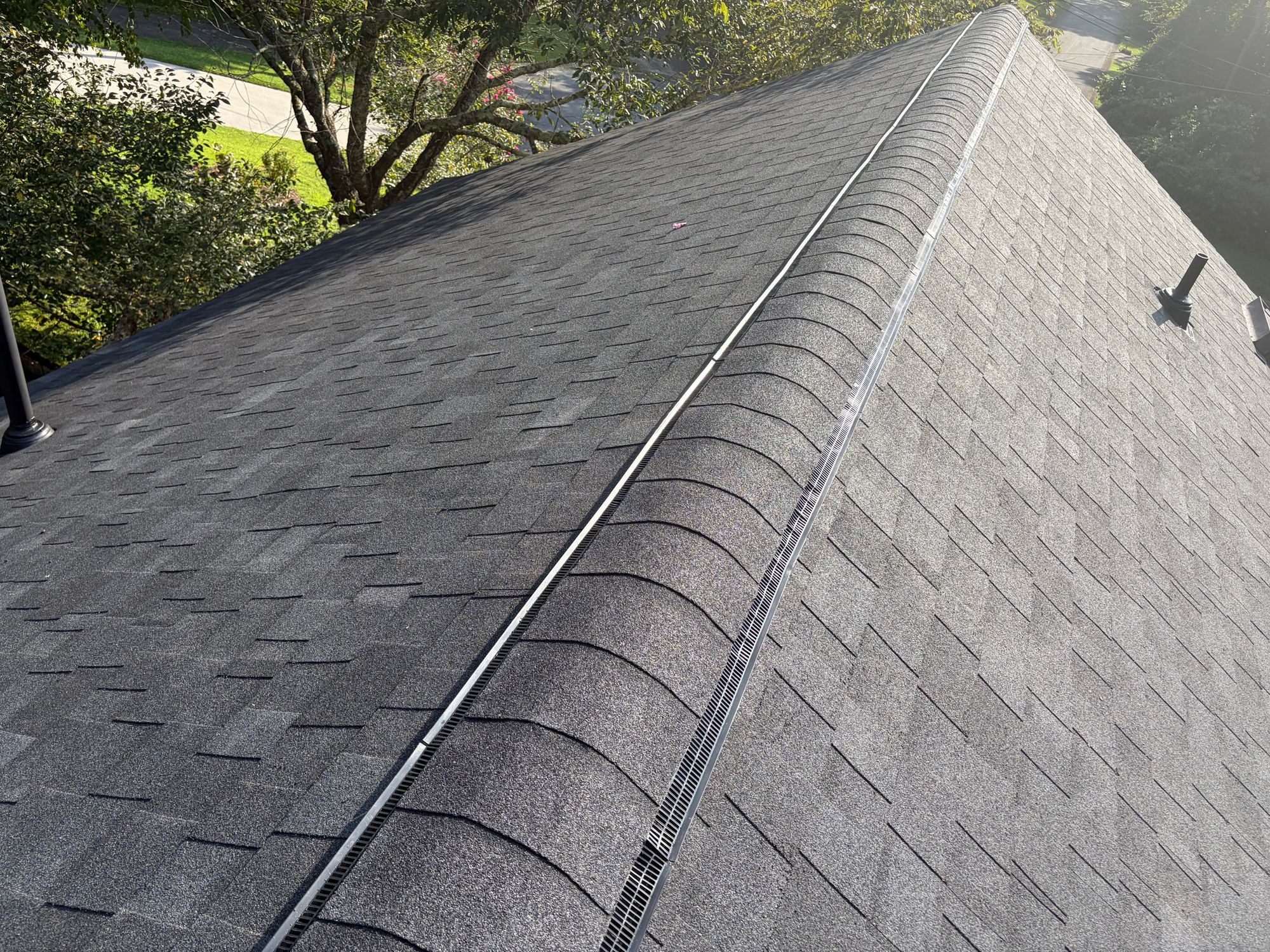 Ridge cap and architectural shingles on a finished roof