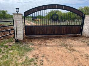 Our Custom gates service can provide a homeowner with a beautiful, one-of-a-kind gate for their home. We can work with the homeowner to create a custom design that will perfectly match their home's style. for Greenroyd Fencing & Construction in Pilot Point, TX