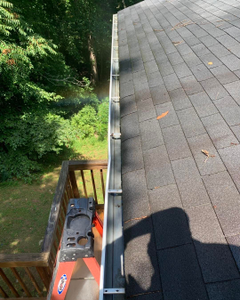 Our gutter cleaning service is a great way to keep your home's gutters clean and free of debris. We use high-pressure water to clean the gutters, and we can also clear any blockages in the downspouts. for Oakland Power Washing in Clarksville, TN
