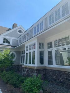 Our Home Softwash service gently and effectively cleans the exterior surfaces of your home using low pressure and a detergent solution, which is then rinsed away. This process is safe for all types of siding, brick, stone, stucco and wood. for Unlimited Softwash in Bellingham, MA