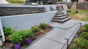 Our Stair Design & Installation service offers homeowners a convenient and reliable solution for enhancing the functionality and aesthetics of their outdoor spaces with professionally crafted concrete stairs. for All Mighty Concrete LLC in Bremerton, WA