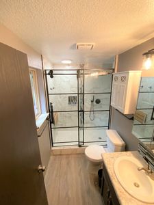 Transform your outdated bathroom into a modern sanctuary with our expert Bathroom Renovation service, offering top-quality materials and skilled craftsmanship tailored to meet your vision. for Racketty Boom Construction  in Centralia, WA