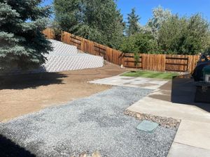 Our Retaining Wall Construction service enhances your landscape's functionality and beauty, offering durable solutions for preventing soil erosion while adding refined elegance to your outdoor space. Transform your yard with expert craftsmanship. for Angels Landscaping in Sparks, NV