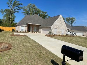 Our Concrete Cleaning service utilizes high-pressure washing techniques to effectively remove dirt, stains, and grime from driveways, patios, and other concrete surfaces for a fresh and polished look. for Tavey’s Pressure Washing in Brandon, MS