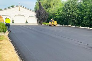 Our professional Asphalt Installation service guarantees a durable and smooth driveway for your home. Enhance curb appeal, protect vehicles, and increase property value with our high-quality asphalt paving solutions. for  JCM Paving and Masonry Inc in Waltham, NH