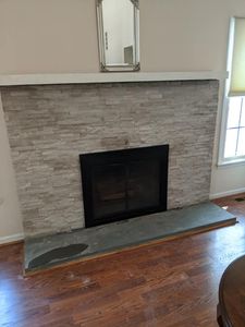 Discover our Spec Stone Fireplaces service, offering homeowners exquisite and customizable stone fireplace designs to elevate the elegance and warmth of their space. for George Moncho Tile and Marble in Hope, NJ