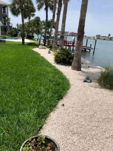 Our Shell Mulch Installation service provides a unique and beautiful look to your lawn, while providing erosion control and weed suppression. for Hefty's Helpers in Saint Petersburg,  FL