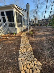 Our drainage service ensures proper water flow, preventing erosion and flooding in your yard. We provide solutions such as French drains, swales, and grading to keep your landscape healthy and functional. for E&T Outdoor Pros in LaGrange, GA