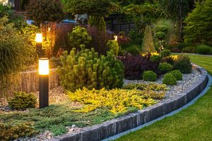 Our Low-Voltage Lighting service enhances the beauty of your landscape while providing efficient and safe lighting solutions that create a welcoming ambiance for your home. for Hipp's Land Management in Tryon, NC