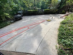 Our Concrete Cleaning service utilizes powerful pressure washing techniques to effectively remove dirt, grime, and stains from your home's concrete surfaces for a fresh and revitalized appearance. for Blast Exterior Cleaning in  Hendersonville, NC