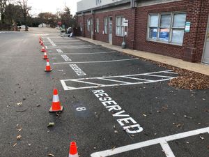 Transform your home's curb appeal with our Asphalt Parking Lot Construction service. We deliver durable and smooth surfaces using top-quality materials and expert craftsmanship for lasting performance and aesthetics. for Payne's Pavement Marking LLC in New Baltimore, VA