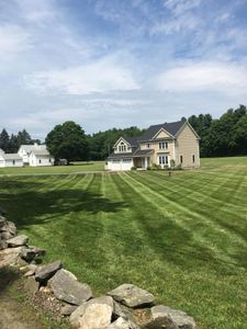 Discover the full potential of your outdoor space with our comprehensive lawn care services. From landscaping to seasonal maintenance, let us enhance your home's curb appeal today! for LD Professional Lawn Care in Lancaster, MA