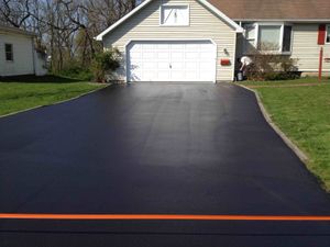 Our Asphalt Seal Coating service is designed to protect and extend the life of your parking lot by applying a protective layer that prevents damage from oxidation, UV rays, and water. for Straight Line Striping in Little Rock, AR