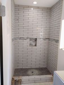 Transform your bathroom with our expert tiling service, offering precision installation, a variety of style options, and durable solutions to enhance both aesthetic appeal and functionality in your home. for West Tile Services in Pocatello, ID