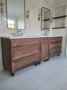 We help homeowners transform their bathrooms into beautiful, modern spaces we'll love. Our services include painting, custom tile work and more! for Go-at Remodeling & Painting in Northbrook,  IL
