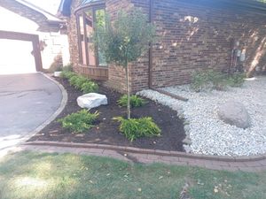 Enhance your garden's health and appearance with our professional mulch installation service, offering nutrient-rich, sustainable options that conserve moisture, reduce weeds, and improve soil quality for a vibrant outdoor space. for Prime Landscaping 219 in Lake Station, IN