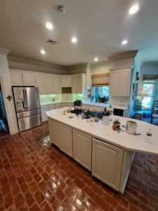 Our kitchen and cabinet refinishing service will transform your old and tired cabinets into beautiful, new ones! We'll remove all the old paint and hardware, sand down the surfaces, and apply a fresh coat of paint. for Hollier's Painting in Lafayette, LA