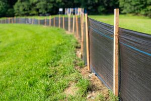 Our Silk Fence service offers reliable, eco-friendly erosion control and sediment management for your property, protecting landscapes during construction while maintaining environmental integrity with minimal maintenance required. Enjoy peace of mind effortlessly. for Holland Hydroseeding LLC in Columbia, MS