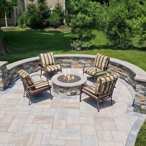 Our Firepits service adds warmth, beauty and ambiance to your outdoor living space. Enjoy cozy nights with friends and family around the fire! for Reyky Landscaping & Masonry LLC in Providence,  RI